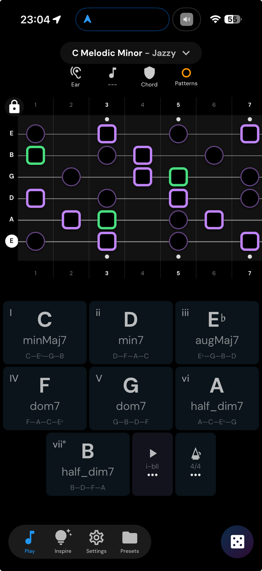 upScale fretboard with a chord active: chord tones glow green, scale notes outlined in purple, out-of-scale notes dimmed, chord grid below.